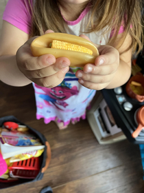 My daughter was playing with her kitchen and asked if I wanted a corn dog