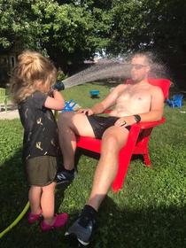My daughters favourite way to cool me off after a long run on a hot day