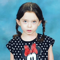 My daughters school picture Shes a bit too obsessed with Wednesday Addams