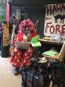My friend is a math teacher but works at the haunted forest on the weekends Here she is grading  tests in the best way possible