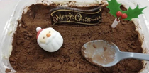 My friend told me it was Christmas themed tiramisu but it looks like Santa is being buried alive