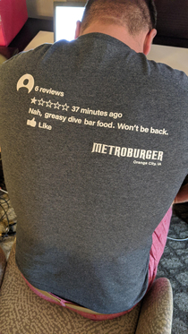 My friends brother owns a burger joint and has one bad review so he decided to make a t-shirt out of it