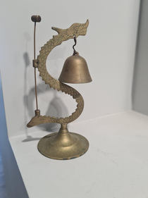 My grandma had a dragon bell that was basically Trogdor The Burninator