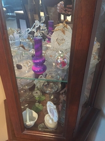 My mom unknowingly bought a bong for her crystalglass collection We have no intention of telling her