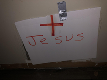My moms renter patched a temporary hole in the wall with Jesus