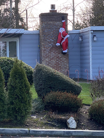My neighbor got himself the Santa inflatable cliffhanger variant RevengeOfTheInflatables