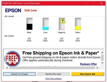My printers colorful low ink warning pop-up has a print this window link