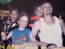 My sister and I enjoying our first roller coaster ride in the back