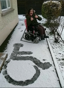 My sister proudly showing off her first snow angel