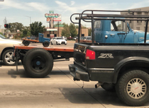 My SO snapped this picture earlier of a truck towing a truck towing a truck True truckception