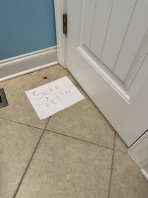 My son delivered a message under the door while I was on the potty it means get out of here in French