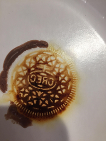 My son tried to microwave an Oreo and burned it it left an imprint on the plate