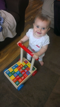 My Wife was at work and I thought it would be nice to send her this pic of our daughter using her baby walker for the first time She immediately forwarded it to her Mum and SisterThen noticed something wrong