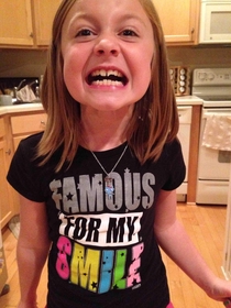 My yr broke her front tooth in half today by roller skating into a wall This was the shirt she was wearing