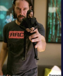 New pic released of Keanu Reeves playing with himself
