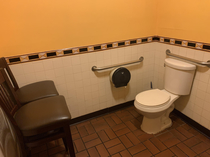 Not sure why this Chinese restaurant has chairs in front of the toilet but my interest is now peaked