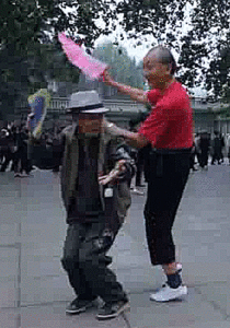 Old Chinese men dancing