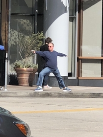 Only in LA this guy doing yoga waiting on his car Brilliant