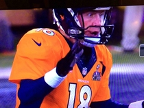Peyton Mannings face as the ball is snapped past him