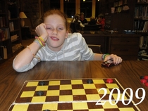 Pic #1 - Every Thanksgiving my little cousin challenges me to a game of checkers Ive been documenting her defeat for the past eight years