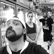 Pic #1 - I am pretty sure some unknown force is following Kevin Smith and giving him surprise Butt Sex during photo shoots