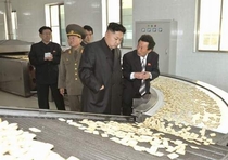 Pic #2 - Kim Jong Un looking at things