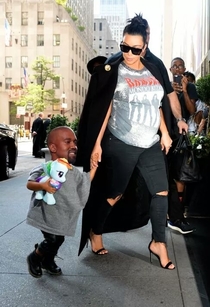Pic #4 - Someone photoshopped Kanye Wests head onto his daughters body