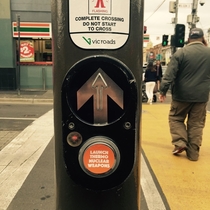 Pic #4 - Workmate put these stickers on crossing buttons around Melbourne