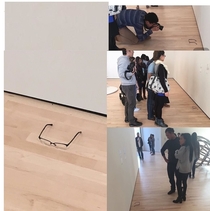 Put glasses on the floor at an art gallery AND