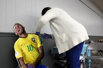 Rare photo of footballer getting his vaccine