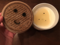 Sibling extinguished candle using its lid
