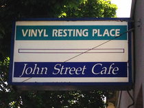 Sign for a used record shop or a cafe with Naugahyde upholstery