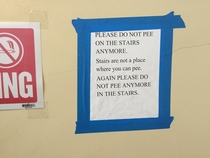 Sign my apartments superintendent posted in the emergency stairwell