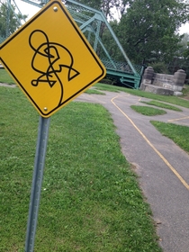Sign on biking trail