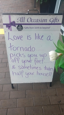 Sign outside flower shop for Valentines