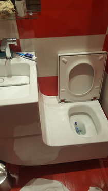 Sink attached to the toilet forming a perfect slide