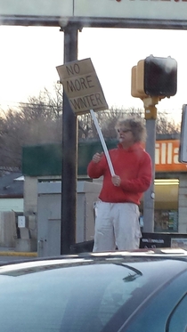 Some guy is protesting winter
