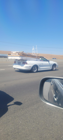 some of the interesting Things you see in the Bay area freeways This is one way to get your money out of your convertible