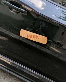 Someone in my neighborhood put this sticker over a scratch on their car