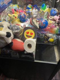 Someone put a roll of TP in the claw machine
