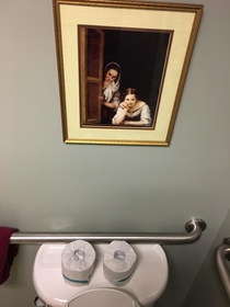 Taking a leak and look up and see this picture Strategically placed I think so