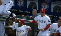 Texas Rangers manager realizes that he is celebrating with the bat boy