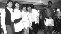 The Beatles all feeling the effects of a single punch from Muhammad Ali