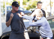 The most Aussie photo of billionaire James Packer fighting another billionaire in a parking lot