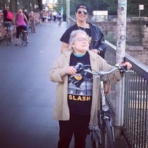 The old lady is a Slash fan but she doesnt know Slash is standing behind her