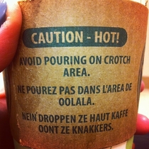 The other languages on this hot coffee sleeve are fake-French and fake-German