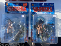 The regular Vampirella next to the chase figure Exactly the sameexcept backwards