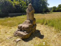 The theme seems to be statues this ones from a roman town in Wales wolf looks like hes enjoying himself