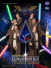 These are the folks in the International Space Station right now Here they are dressed up as Jedi and posing for an official crew poster