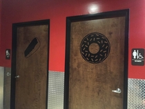 These bathroom signs at a donut shop